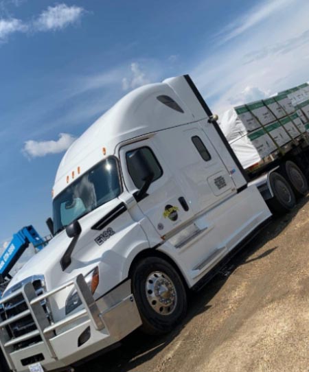 Eclipse Transport Ltd white truck transporting goods